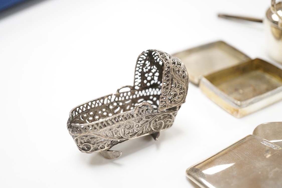 Sundry small silver including two pill boxes, a concave card case, Saunders & Shepherd, Chester, 1897, 79mm, unmarked toddy ladle with baleen handle, 925 flower ornament, small cream jug, two pairs of Georgian sugar tong